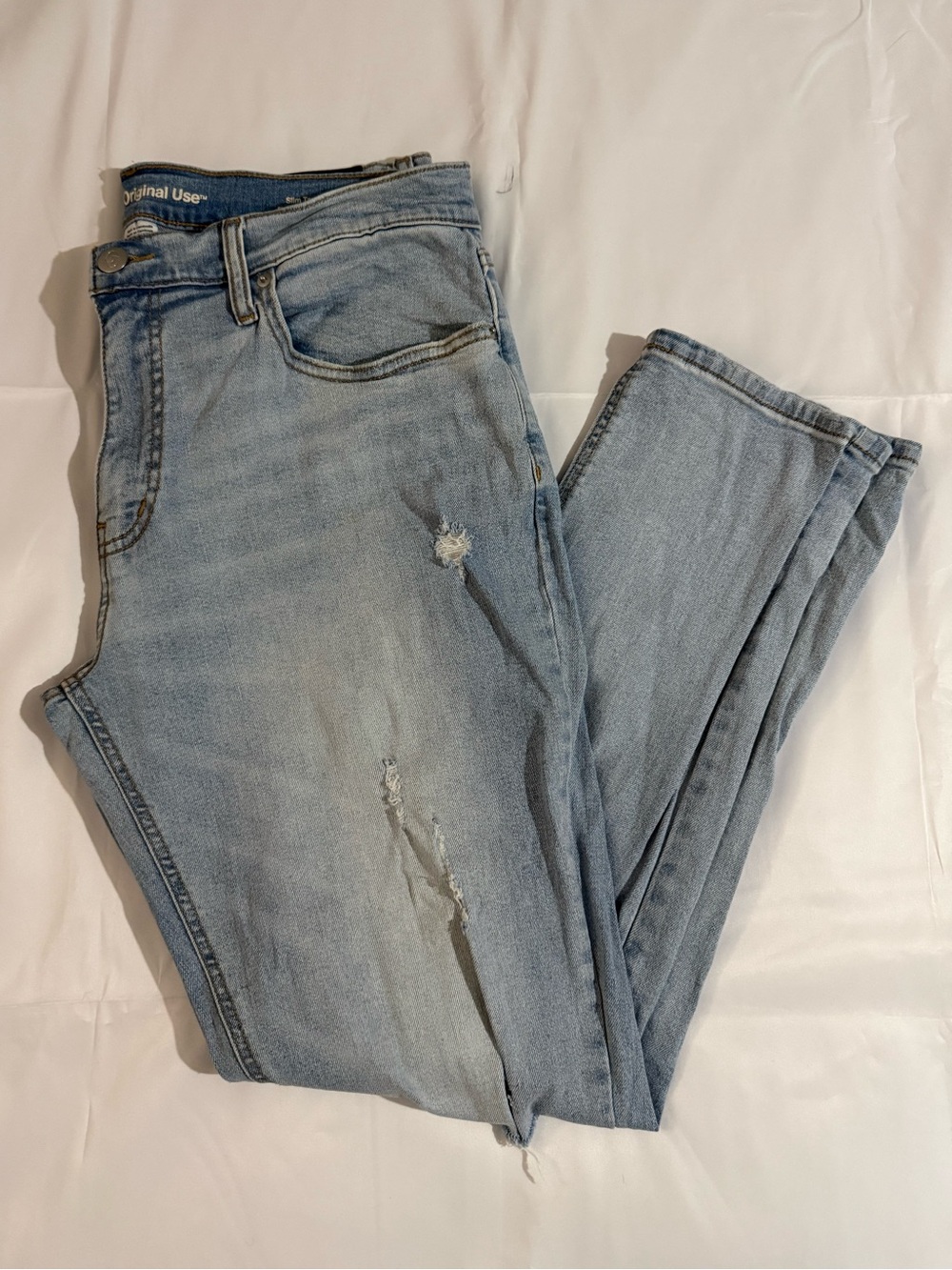 Original Use Slim Taper Distressed Light Wash Jeans